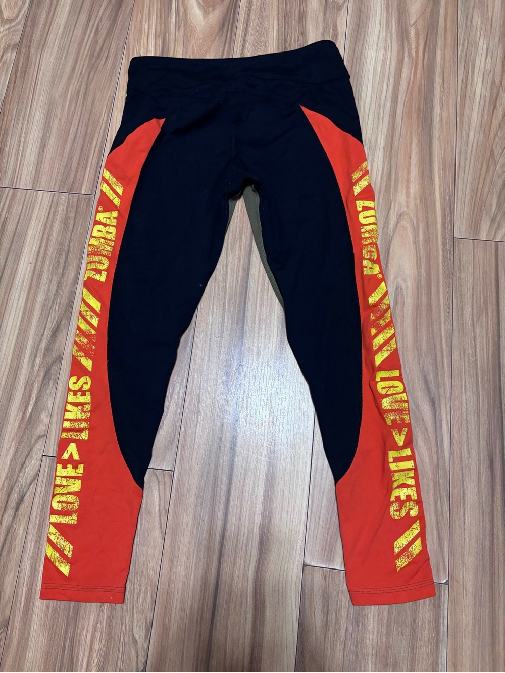 Zumba Women’s Black and Red Athletic Leggings with Yellow Graphic